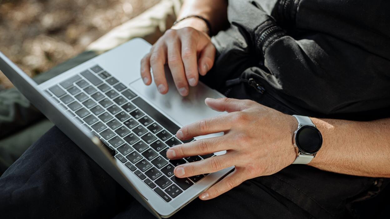 Hands on laptop