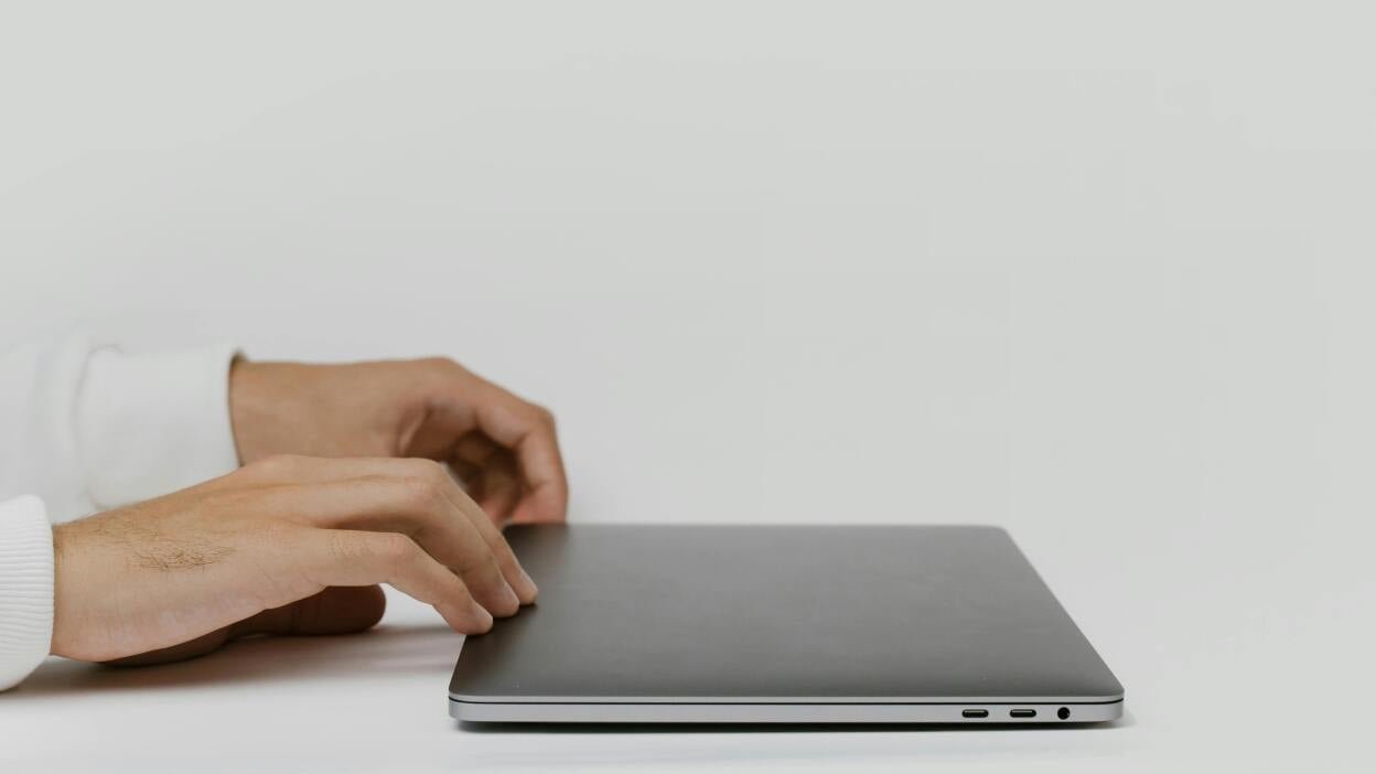 Fingers on laptop